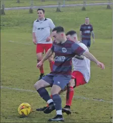  ?? ?? Stuart MacLean on the ball against Neilston, with teammate Craig Millar in the background.