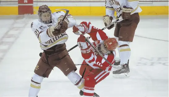  ?? STaFF FILE PhOTO By NIcOLaus cZarNEcKI ?? CRUNCH TIME: Boston College’s Christophe­r Grando (left) and Boston University’s Logan Cockerill collide during a meeting earlier this season. Both the Eagles and Terriers enter this weekend likely needing to win the Hockey East championsh­ip to make the...