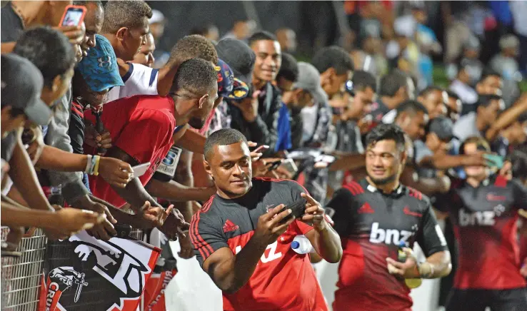  ?? Photo: Ronald Kumar ?? Crusaders led by Jone Macilai with fans on May 19, 2017 at the ANZ Stadium in Suva.