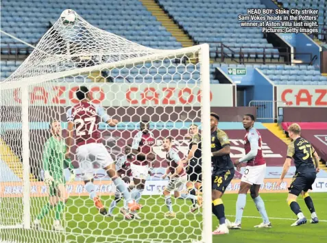  ??  ?? HEAD BOY: Stoke City striker Sam Vokes heads in the Potters’ winner at Aston Villa last night. Pictures: Getty Images