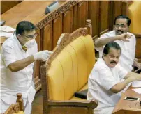  ?? PTI ?? IUML MLA Parakkal Abdullah arrives in the Kerala Assembly, wearing a mask and gloves to seek attention of the house towards the outbreak of Nipah virus, in Thiruvanan­thapuram on Monday. —