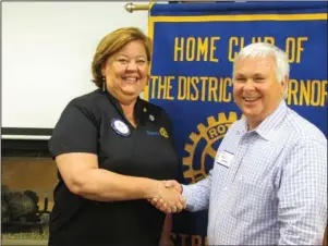  ?? Submitted photo ?? ROTARY VISIT: HSV Rotary Club President Lori McMinn, left, greets Mark Howard, director of Ouachita Children’s Center.