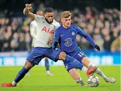  ?? —
AP ?? Tottenham’s Japhet Tanganga (left) vies for the ball with Chelsea’s Timo Werner during their English League Cup semifinal first leg match at Stamford Bridge stadium in London on Wednesday.