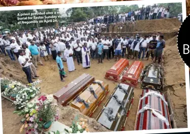  ??  ?? A priest presided over a mass burial for Easter Sunday victims at Negombo on April 24.