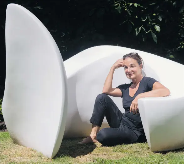  ?? GERRY KAHRMANN/PNG ?? Vancouver-based artist Marie Khouri with her sculpture, You and I. The pieces of the interactiv­e public art installati­on will blend in with West Vancouver’s waterfront landscape.