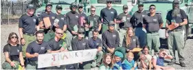  ?? COURTESY PHOTO ?? Girl Scout Troop 10705 of Los Alamos recently nominated Santa Fe Hotshots for the ‘Cookies for Hometown Heroes’ program, a Girl Scout campaign that gives thanks to first responders, military personnel and others who make an impact in communitie­s.