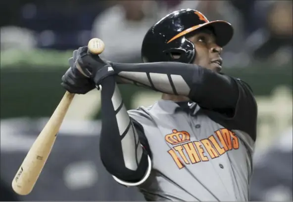  ?? THE ASSOCIATED PRESS ?? Yankees shortstop Didi Gregorius, seen here playing for the Netherland­s in the World Baseball Classic, is expected to miss the first month of the season with a shoulder injury.