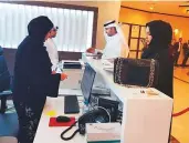  ?? Samihah Zaman/Gulf News ?? Candidates register for FNC polls at the Abu Dhabi Chamber of Commerce Centre.
