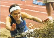  ?? Christian Abraham / Hearst Connecticu­t Media ?? Glastonbur­y’s Selina Soule competes in the girls long jump during Class LL track and field championsh­ip in New Britain on May 29.
