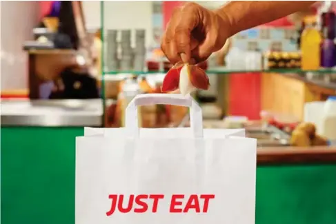  ?? (Just Eat/PA) ?? The online food delivery firm has returned to underlying earnings despite seeing a drop in orders