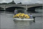  ??  ?? Thanks to the boat, volunteers can transport all rubbish bags to the south bank for easy collection.