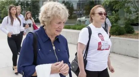  ?? CARLOS OSORIO/TORONTO STAR ?? Michael MacIsaac’s mother Yvonne MacIsaac and Sammy Yatim’s mother Sahar Bahadi arrive at the coroner’s inquest into Michael MacIsaac’s death.