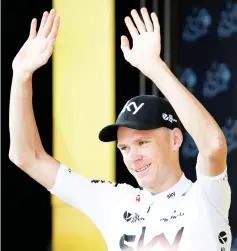  ?? — Reuters photo ?? Chris Froome celebrates on the podium at The 104th Tour de France cycling race in this July 11, 2017 file photo.