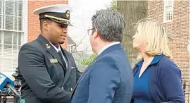  ?? LUKE PARKER/BALTIMORE SUN ?? Naval Academy Midshipman Trey Cummings shakes hands with Anne Arundel State’s Attorney Anne Colt Leitess on Feb. 24outside the Anne Arundel County Circuit Court after Cummings’ mother’s killer, Angelo Harrod, was sentenced to life in prison without the possibilit­y of parole in her death.