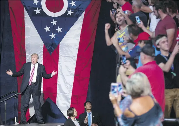  ?? EVAN VUCCI / THE ASSOCIATED PRESS ?? Republican presidenti­al candidate Donald Trump arrives for a campaign rally earlier this week in Toledo, Ohio.