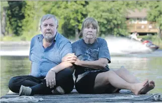  ?? JULIE OLIVER ?? Peter and Gail Allen live on a narrow section of the Rideau River, between Manotick and Kars, and say boat traffic, combined with high water levels from flooding this year, is causing wake damage to their property.