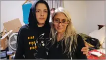  ?? ?? Lukas Moody, 14poses for a photo with his mother, Marygrace Lankhorst, at a motel in Fort Morgan, Colo. on Jan. 16. Their family has struggled with homelessne­ss for years in rural Fort Morgan.