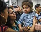  ?? DANIELE VOLPE / THE NEW YORK TIMES ?? Fernanda Jacqueline Davila, 2, traveling with a maternal grandmothe­r, was taken into custody at the border Oct. 25 in Texas and placed in a foster care facility.