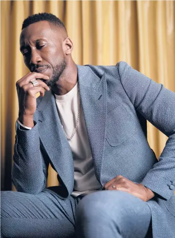  ?? CHANELL STONE/THE NEW YORK TIMES ?? Two-time Oscar winner Mahershala Ali, who is seen Jan. 13 in California, stars in the sci-fi drama “Swan Song” as both a dying man and the clone that will replace him. His performanc­e has garnered rave reviews.