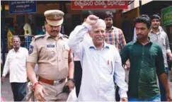  ??  ?? Rao gestures during his arrest in Hyderabad on Tuesday.