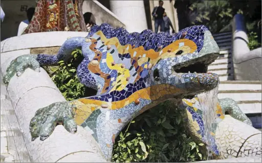  ??  ?? LEFT: Dragon at Park Guell in Barcelona by Antoine Gaudi.