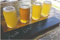  ?? MARTA GOLD ?? A flight of craft beers at Rural Routes Brewing Co., located at 4901 50 St. in Leduc.