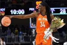  ?? Nam Y. Huh / The Associated Press ?? Team Wilson's Sylvia Fowles smiles as she walks to the bench during the first half of Sunday’s WNBA All-star Game against Team Stewart in Chicago.