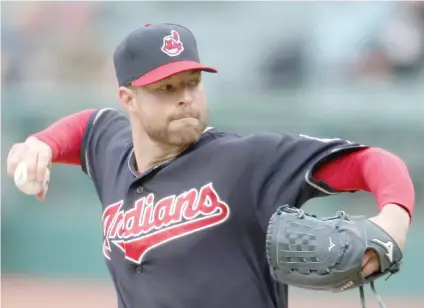  ?? Corey Kluber, pilar de una campaña brillante de los Indios, que se desinflaro­n en la postempora­da. ??