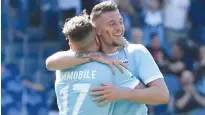  ?? Reuters ?? Lazio’s Sergej Milinkovic-savic (right) celebrates with a team-mate after scoring a goal against Sampdoria during their Italian League match on Sunday.