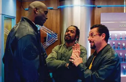  ?? A24 ?? Kevin Garnett, from left, Lakeith Stanfield and Adam Sandler star in “Uncut Gems.”