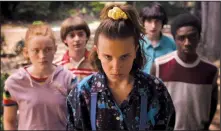  ?? Netflix ?? Sadie Sink (left), Noah Schnapp, Millie Bobby Brown, Finn Wolfhard and Caleb McLaughlin star in the hit Netflix series Stranger Things.