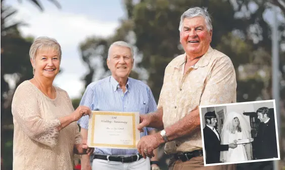  ?? Photo: Scott Powick ?? Minister Geoff Prentice (centre) again presides over the exchange of vows for Lois and Allan Cottrell 50 years after their first time.