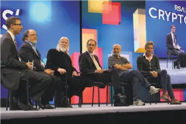  ?? Jim Wilson / New York Times 2016 ?? Paul Kocher (left) moderates a computer security conference in San Francisco in March 2016. Kocher is one of the researcher­s who discovered the microproce­ssor flaws.