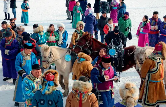  ??  ?? Mongolian clothing in winter.