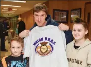  ?? JESI YOST — FOR MEDIANEWS GROUP ?? Paul Sheridan, with Jacob Sheridan, 8, and Emily Sheridan, 14, shows the WATCH D.O.G.S. shirt that volunteers receive when they become Watch Dads.