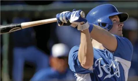  ?? ASSOCIATED PRESS ?? Kansas City Royals’ Chris Getz watches his solo home run during the fifth inning of an exhibition spring training baseball game against the Cincinnati Reds Friday in Surprise, Ariz.