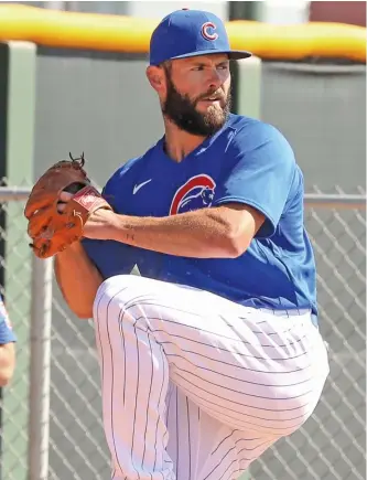  ?? JOHN ANTONOFF/SUN-TIMES ?? Velocity is no longer the name of Jake Arrieta’s game. In his first Cactus League start Sunday, he averaged 92 mph on his sinker, almost identical to his average sinker velocity in 2019 and ’20.