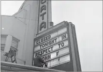  ??  ?? An Arcata Theater employee changes the marquee the day of John F. Kennedy’s death in Dallas, Texas.