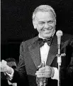  ?? [AP FILE PHOTO] ?? Frank Sinatra appears May 18, 1977, on the stage of the Westcheste­r Premier Theater in Tarrytown, N.Y., during the opening night of his act with Dean Martin. Sotheby’s will auction scores of items that belonged to Frank Sinatra and his wife of 22 years, Barbara.