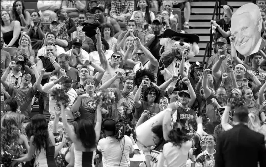  ?? JULIE JACOBSON / ASSOCIATED PRESS FILE (2013) ?? Arizona fans cheer for their team during a Pac-12 tournament game March 14, 2013, at the MGM Grand Garden Arena.