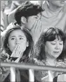  ??  ?? ASSOCIATED PRESS Japanese soccer fans react to a strong earthquake Saturday.