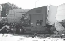  ?? NEIL BOWEN ?? Two occupants of this truck suffered minor injuries during the July 25 crash on westbound Highway 402 in Sarnia.