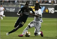  ?? MIKEY REEVES — FOR MEDIANEWS GROUP ?? Jamiro Monteiro, left, pursuing LAFC’s Latif Blessing in a Sept. 14 game, is happy and secure with his pending No. 10 role with the Union.