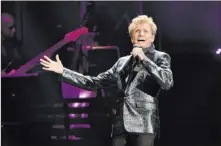  ?? The Associated Press file ?? Barry Manilow performs at the Allstate Arena in Rosemont, Ill., in 2017. His Las Vegas shows in early 2021 are delayed.