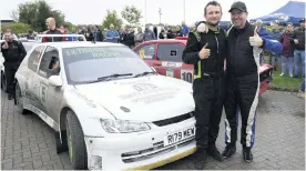  ??  ?? Winning crew:west (l) and Hannah celebrate with Peugeot 306 Maxi