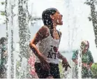  ?? ALBA VIGARAY/EPA-EFE ?? Children play Monday in a water fountain at Battery Park in New York City. Temperatur­es in New York City were expected to reach highs of 96 degrees as a heat wave scorched the East Coast.