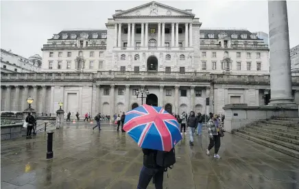  ?? Photo / AP ?? The Bank of England (pictured) has hinted rates may now have to increase by less than markets expect.