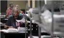  ?? Photograph: Charlie Riedel/ ?? Election worker Kenneth Conkle processes mail-in ballot requests Tuesday in Olathe, Kansas.