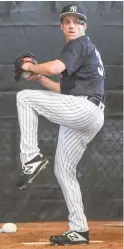  ?? AP ?? Ex-Sox right-hander Danny Farquhar wore a specially designed protective cap in his first spring-training bullpen session with the Yankees on Friday.