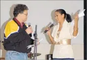  ?? Getty Images ?? THEN-COMEDIAN Al Franken and Leann Tweeden perform on a USO tour in Mosul, Iraq, in 2006.